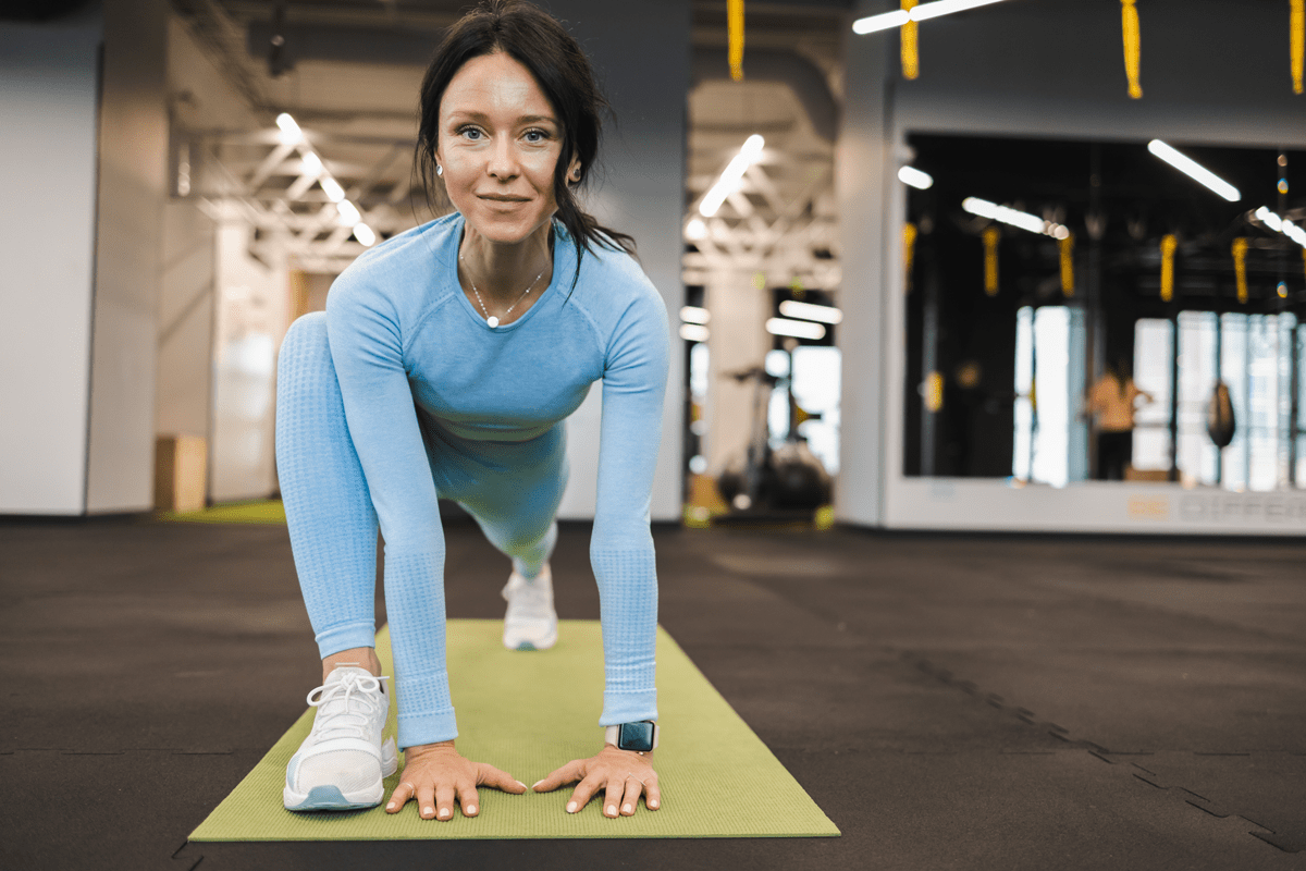 woman-doing-stretching-in-the-gym-pilates-exercis-2022-01-10-21-19-22-utc-min