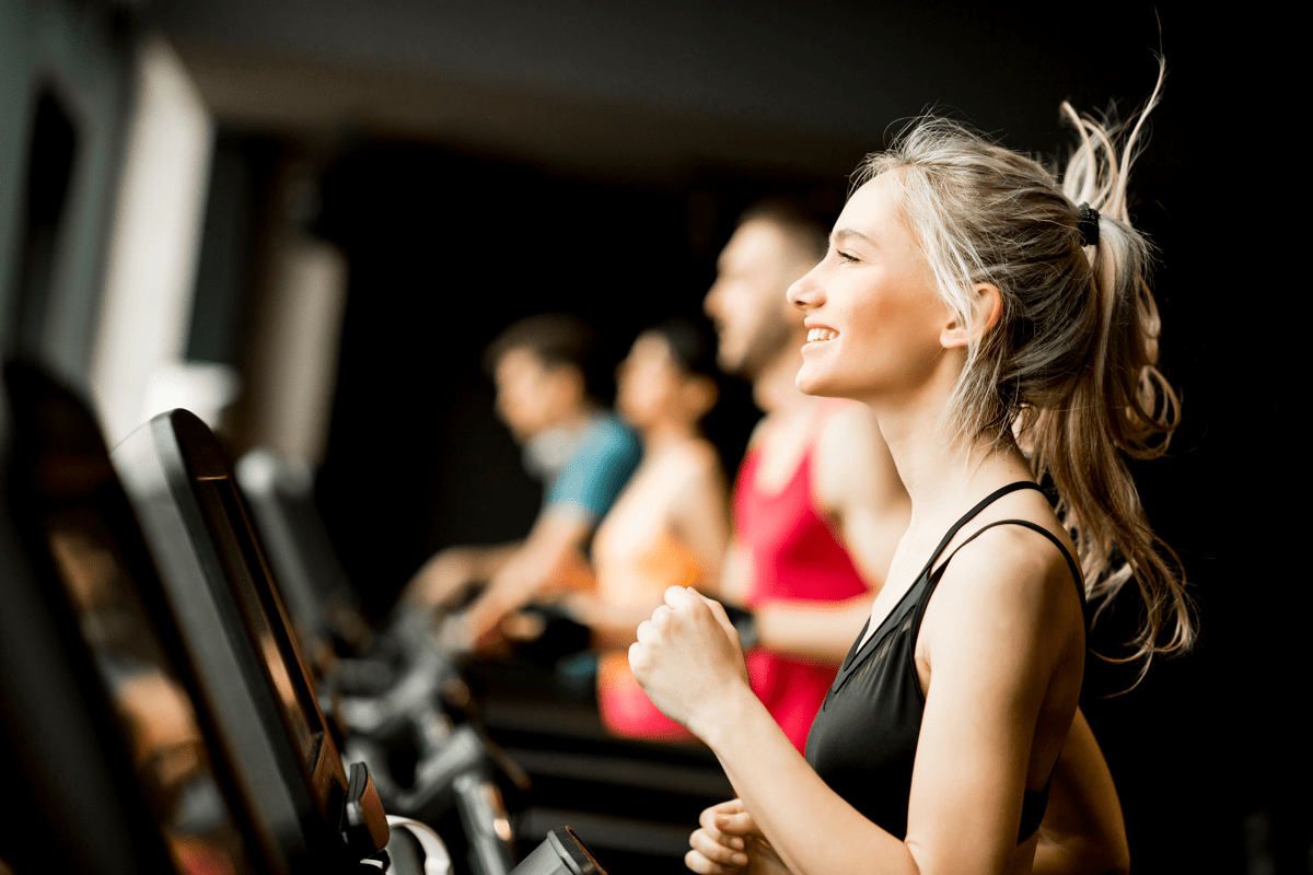 young-people-running-on-treadmills-in-modern-gym-2022-04-19-01-58-46-utc-min